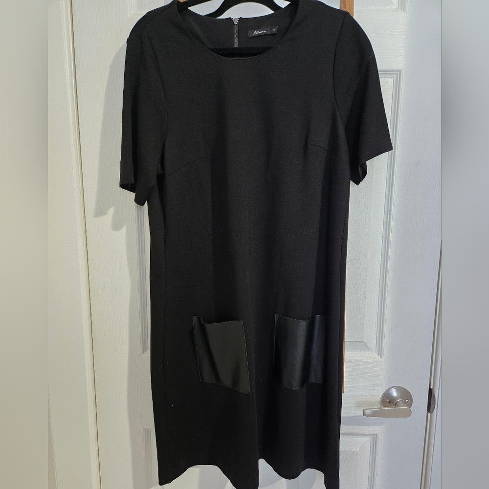 Elegant Black Dress with Pocket Detail